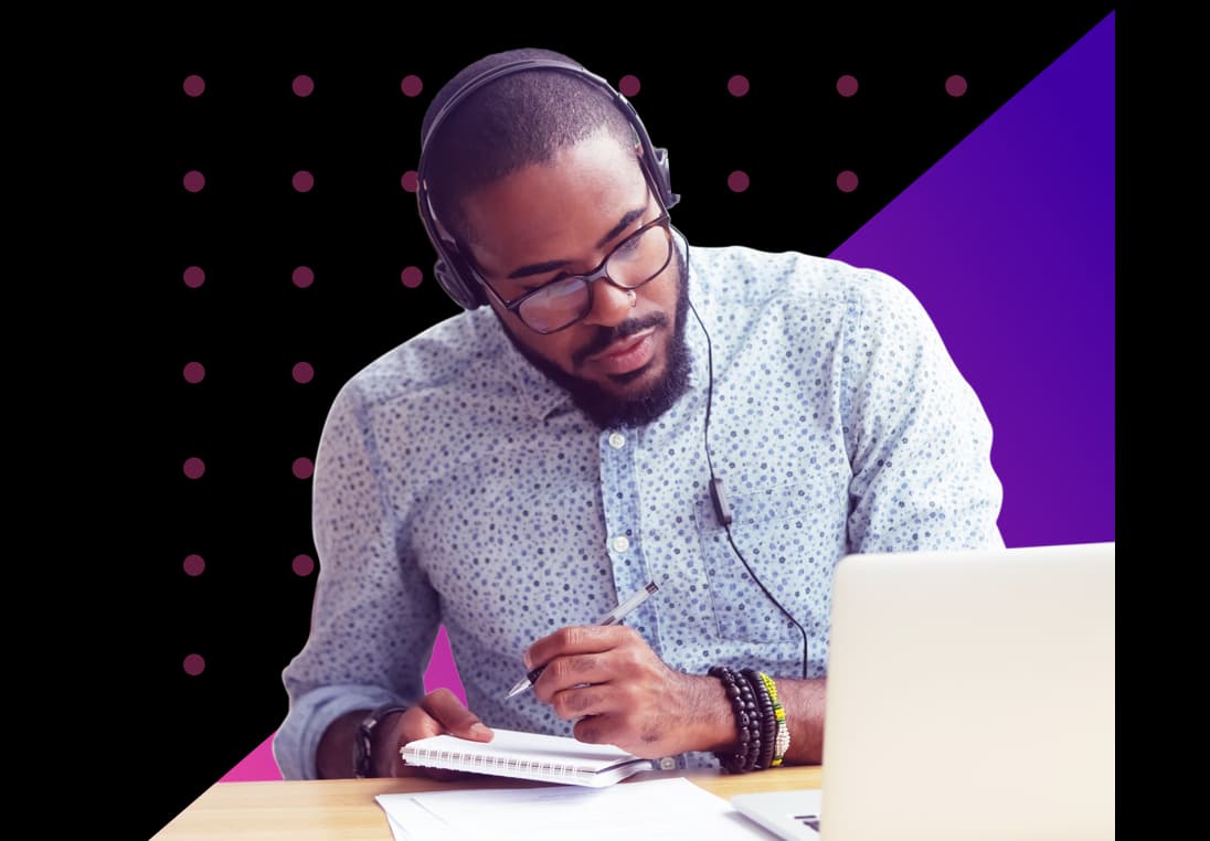 person on laptop working at desk with gradient triangle and dot design in background